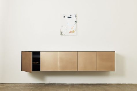 The Connect Floating Credenza is shown in Blackened Steel and Silicone Bronze. All New Format pieces are crafted by hand in Vancouver, Canada. #newformatstudio #connect #credenza #console #hangingcredenza #floatingconsole #sideboard #bronzecredenza #credenzadecor #credenzastyling #designideas #livingroomdecor #handcrafted #shelvingunit #siliconebronze Floating Credenza, Floating Sideboard, Floating Media Console, Credenza Styling, Credenza Decor, Metal Sideboard, Blackened Steel, Sideboard Designs, Vancouver Canada