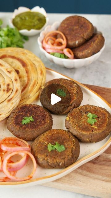 Nikita Varma Chef/Foodblogger on Instagram: "Indulge in a taste sensation with our Mushroom Galouti Kebabs, perfectly paired with crispy Lachha Paratha. Each bite of these succulent kebabs bursts with umami-rich mushrooms and a blend of aromatic spices, while the Lachha Paratha adds a flaky, buttery contrast. 
Together, they create a symphony of flavors and textures that's truly out of this world.

#FoodieHeaven #GourmetDelight #mushrooms #mushroomrecipes" Mushroom Galouti Kabab, Lachha Paratha, Kebabs, Mushroom Recipes, Out Of This World, This World, Food Blogger, Succulent, Stuffed Mushrooms