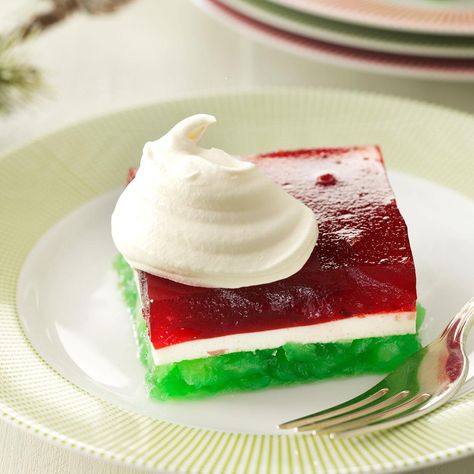 Layered Christmas Gelatin Recipe -Christmastime always means that this recipe comes out of my recipe box. The traditional holiday colors in this salad make the buffet table look so pretty. —Diane Schefelker, Ireton, Iowa Sugar Free Jello Desserts, Desserts For Christmas, Congealed Salad, Gelatin Salad, Strawberry Gluten Free, Salad Cucumber, Layered Jello, Jello Dessert Recipes, Gelatin Recipes