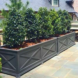 long, custom grey planter with X pattern design on front Extra Large Outdoor Planters, Railing Flower Boxes, Front Yard Planters, Yard Planters, Boxwood Landscaping, Long Planter, Long Driveway, Large Backyard Landscaping, Outdoor Planter Boxes