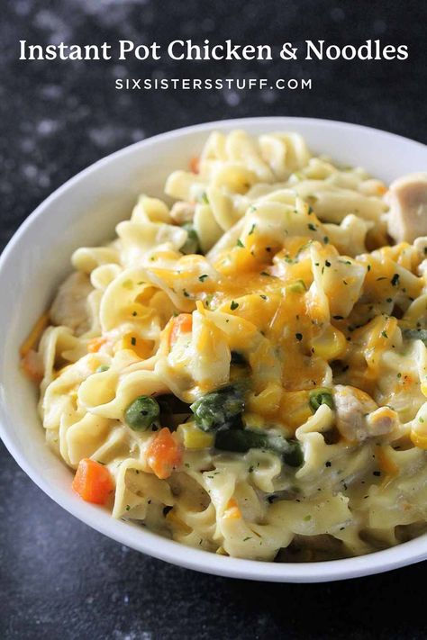 This Creamy Chicken and Noodles with Vegetables is one of our favorite casserole dishes made to work in your pressure cooker! Cheesy and hearty, this easy family dinner is ready in less than 30 minutes from start to finish. 6 Sisters Recipes Instant Pot, Instant Pot Chicken Noodle Casserole, Chicken Noodle Instant Pot Recipes, Instant Pot Chicken And Noodles Recipes, Instapot Chicken And Noodles, Instant Pot Chicken And Noodles, January Meals, 6 Sisters, Creamy Chicken And Noodles