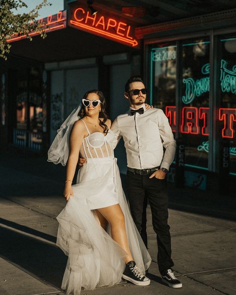 Elope in Las Vegas and celebrate on Fremont Street! Las Vegas Photographer: @treeoflifelasvegas Wedding Venue: @littlewhiteweddingchapel @alittlewhiteweddingchapel Wedding Dress: @lestudio.rose Shoes: @vans @converse Jewelry/Rings: @kayjewelers @reisman_aliancas #elope #elopement #lasvegaselopement #lasvegaselopementphotographer #vegaselopement #vegaselopementphotographer #lookslikefilm #vegasphotoshoot Vans Wedding, Vegas Elopement Bouquet, Wedding Dress With Sneakers, Retro Vegas Elopement, Vegas Desert Elopement, Vegas Elopement Ideas Photography, Las Vegas Elopement Announcement, Vegas Wedding Dress, Wedding Converse