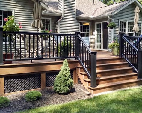 35 Unique Deck Railing Ideas | Sebring Design Build Non Wood Deck Ideas, Gray House Brown Deck, Unique Deck Railing, Unique Deck Railing Ideas, Deck Skirting Ideas, Deck Redo, Patio Plan, Skirting Ideas, Back Deck Ideas