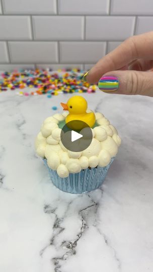 3M views · 35K reactions | Rubber ducky cupcakes 🛀 💛 🦆 I used colour mill yellow chocolate drip in my silicone duck mold ( I got this from Amazon) I used piping tips 2A and 12 to create the buttercream bubbles. I chilled the  cupcake before adding blue jelly to the centre. I sat the chocolate ducky on top when the jelly had set. if you don’t like jelly on a cake then you could use blue chocolate instead 💛🦆💛#cupcake #cakedbyrach #cute #rubberduck #cakeart #cakedecorating | Caked By Rach | Benson Boone · Sugar Sweet Ducky Cupcakes, Hobbit Food, Marshmallow Popcorn, Decorated Cupcakes, Rachel Lindsay, Benson Boone, Creative Snacks, Cupcake Cake Designs, Blue Chocolate