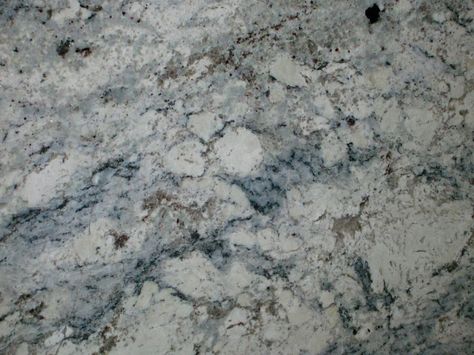 Grey and blue veining in a white ice granite slab - Decoist White Ice Granite, Blue Granite Countertops, Granite Bathroom, Kitchen Remodel Countertops, Outdoor Kitchen Countertops, Kitchen Countertop Materials, Blue Granite, Eclectic Kitchen, White Interior Design