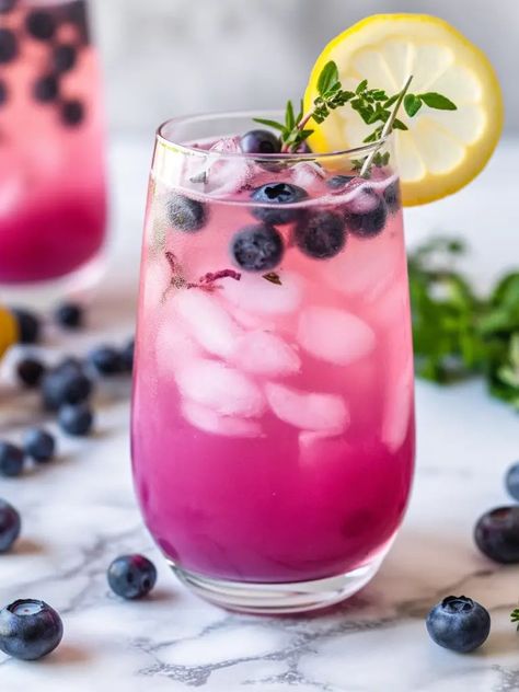 This thirst-quenching Blueberry Lavender Lemonade is the ultimate summer refreshment! Packed with antioxidants, it aids digestion and helps relieve stress. 🍇💆‍♀️ Click the pin for the full recipe and enjoy a glass of this delicious and nutritious summer drink. Cheers to staying refreshed, relaxed, and hydrated! 🍹💧 #summerdrink #refreshing #healthybeverage #antioxidants #lowcalorie For more amazing recipes, follow @silverforkglutenfree on Pinterest! 🌟 Virgin Summer Drinks, Blueberry Lavender Lemonade, Healthy Summer Drinks, Gluten Free Drinks, Blueberry Lavender, Culinary Lavender, Lemonade Cocktail, Lavender Lemonade, Hydrating Drinks