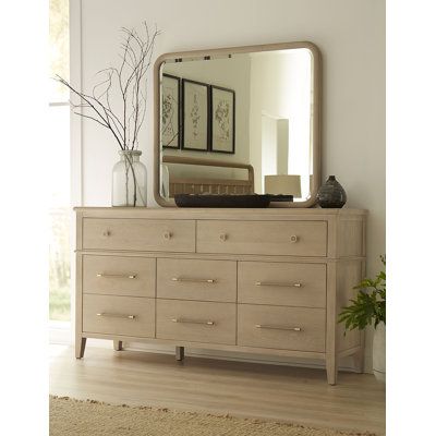 This versatile wall mirror offers dual functionality, designed to be mounted on a dresser or hung on your wall. It's made with a solid rubberwood frame that's simple and unadorned, allowing it to blend seamlessly with various decor styles from traditional to coastal. The beveled glass adds a subtle touch of elegance to your space. This mirror comes with hardware for dresser mounting in a horizontal orientation and keyhole brackets for wall mounting in either orientation (additional hardware requ Double Dresser In Bedroom, Horizontal Dresser, Townhome Decor, Townhome Decorating, Transitional Dresser, Bedroom Furniture Ideas, Stylish Mirror, 9 Drawer Dresser, Wooden Dresser