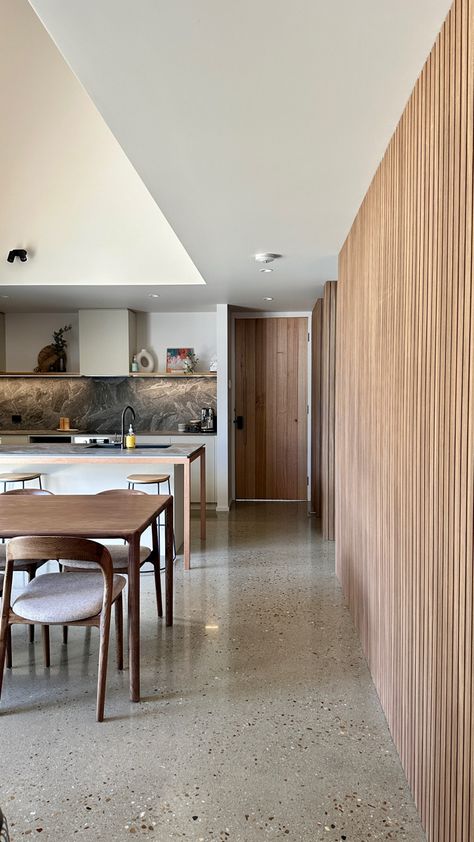 Polished concrete floors and timber feature wall Polished Concrete Floor Kitchen, Concrete Shed, Concrete Floor Kitchen, White Concrete Floors, Concrete Kitchen Floor, Concrete Floors Living Room, Polished Concrete Kitchen, Concrete Floors In House, Painting Floors