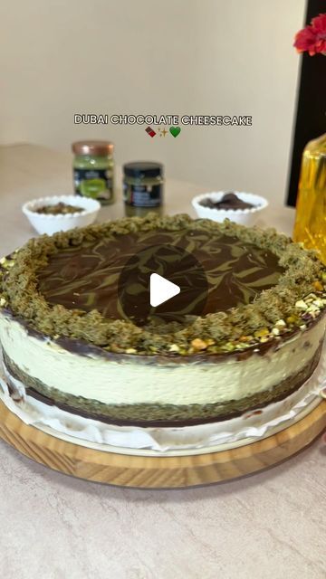 EatOutCyprus on Instagram: "DUBAI CHOCOLATE CHEESECAKE🍫✨💚

For the chocolate ganache: 
300 gr chocolate
40 gr unsalted butter (optional see tip below)

For the base: 
500 gr kataifi pastry
125gr unsalted butter
300gr pistachio cream @alphamegacy 

For the cream: 
600 gr cream cheese 
200 ml whipping cream
200 gr melted white chocolate 
2 tbsp icing sugar 
250 gr pistachio cream
(Let it cool in the fridge for at least an hour)

For the decoration: 
50 gr crushed pistachios 
50 gr pistachio cream 
leftover kataifi base 

Tip: Butter will turn the ganache rich and shiny but also turn the liquid stiff. To fix the seized chocolate, add a splash of whole milk or whipping cream and whisk for a minute. This will help and give a more melt in the mouth texture ⭐️

#recipe #dubaichocolate #cheeseca Dubai Chocolate Cheesecake, Dubai Chocolate Cake, Chocolate Cheesecake Decoration, Pistachio Cheesecake Recipe, Dubai Cake, Kataifi Pastry, Crushed Pistachios, Dubai Chocolate, Pistachio Cheesecake