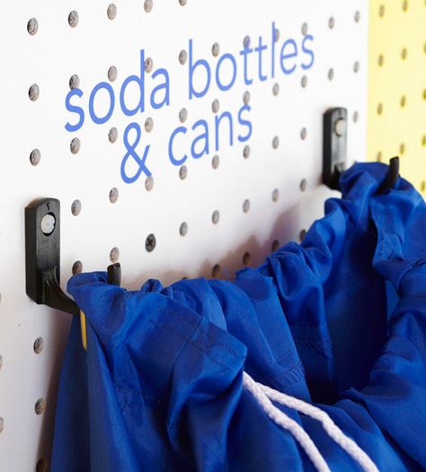 Taking cans and bottles to your return center is less of a hassle when you dedicate a bag or other container to the job. Hang the bag from a pair of hooks (using two hooks ensures stability) and add a label so everyone knows what items can be returned for a deposit. Recycle Organization, Ideas For Recycling, Organization Bins, Recycling Storage, Storage Organization Ideas, Recycling Station, Recycling Information, Recycle Cans, Recycling Center