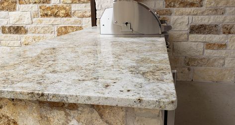 Natural stone is the best material for an outdoor kitchen. This one features Colonial Gold granite with a polished finish. Installed for Ashby Signature Homes in Austin, TX. Outdoor Countertops, Colonial Gold Granite, Best Countertop Material, Super White Granite, Outdoor Countertop, Brown Granite Countertops, Quartz Stone Countertops, Austin Stone, Caesarstone Quartz