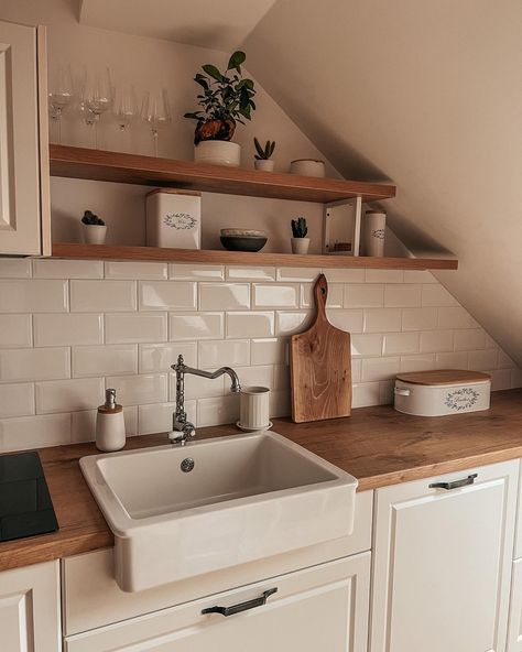 Cozy farmhouse style kitchen with white tiles and deep sink. Wood and cream colours Kitchen With White Tiles, Wood Worktop Kitchen, Farmhouse Cozy, Wood Countertops Kitchen, Diy Upholstery, Country Cottage Kitchen, Deep Sink, Cosy Kitchen, Neutral Kitchen