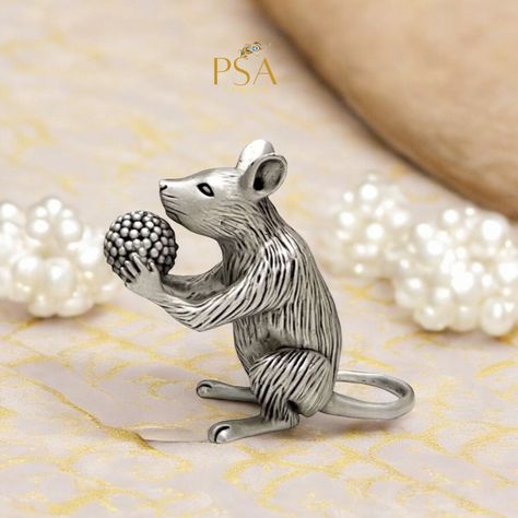 “Bring home the divine blessings of Mushakraj! Crafted in pure 92.5 silver, this exquisite idol symbolizes wisdom and prosperity. A perfect addition to your sacred space. 🐭✨ #PSAJewels #PureSilver #Mushakraj #DivineBlessings #HomeDecor #Mushakraj #PureSilver #PSAJewels #DivineBlessings #HomeDecor #SacredSpace #HinduDeity #SpiritualDecor #viral #trend #diwali #ganesh #ganesha #diwali Divine Blessings, Spiritual Decor, Hindu Deities, Viral Trend, Sacred Space, Ganesha, The Divine, Pure Silver, Diwali