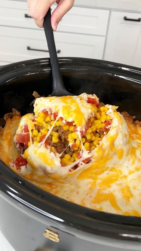 Easy crockpot dinner | dinner, Rick Lax, Doritos, casserole | Easy crockpot dinner Woman makes a doritos casserole in a crockpot. This original video was produced by Network Media, Rick Lax, LLC, and Justine Kameron | By My Life | Facebook | Alright, we have one bag of Doritos nachos in our crockpot. I'm going to go ahead and start crushing it. Okay. Once your Doritos are nicely crushed up, you're going to want to grab some already cooked ground beef and put it right on top of those Doritos. T Doritos Casserole Crockpot, Dorito Casserole Hamburger Crockpot, Dorito Casserole Crockpot, Crockpot Dorito Taco Casserole, Dinner Easy Crockpot, Crockpot Dinner Easy, Crockpot Sides, Doritos Casserole, Justine Kameron