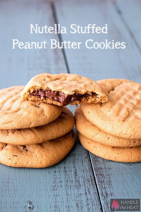 Nutella Stuffed Peanut Butter Cookies Stuffed Peanut Butter Cookies, Dessert Cookies, Handle The Heat, Nutella Cookies, Cookie Butter, Butter Cookies Recipe, Nutella Recipes, Holiday Cookie Recipes, Peanut Butter Cookie Recipe