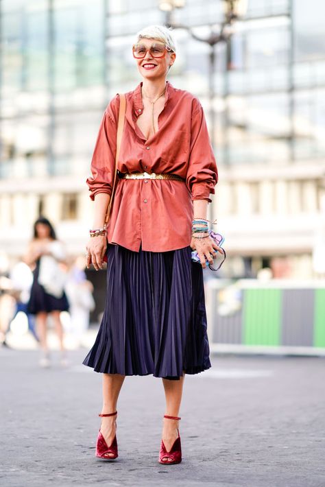 PARIS, FRANCE - JULY 04: A guest wears a pink silk top, a golden belt, a dark blue pleated skirt, red shoes, a red bag, sunglasses , outside Fendi, during Paris Fashion Week Haute Couture Fall Winter 2018/2019, on July 4, 2018 in Paris, France. (Photo by Edward Berthelot/Getty Images) Blue Pleated Skirt For Fall, Chic Blue Pleated Skirt For Fall, Chic Red Pleated Skirt For Spring, Luxury Blue Pleated Chic Skirt, Elegant Red Pleated Midi Skirt, Blue Pleated Skirt, Pink Silk, Silk Shirt, Silk Top