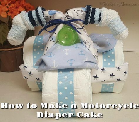 How to Make a Motorcycle Diaper Cake as a baby shower gift! Baby Shower Motorcycle, Diaper Decorations, Cake Motorcycle, Motorcycle Diaper Cake, Diaper Motorcycle Cake, Dinosaur Baby Shower Theme, Diaper Cake Instructions, Motorcycle Cake