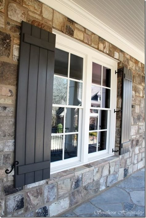 Black shutters, shutter dogs, stone, white trim, porch ceiling....like it all! Window Shutters Exterior, Black Shutters, House Shutters, Diy Shutters, Brick Exterior House, Shutters Exterior, Wood Shutters, Atlanta Homes, Windows Exterior