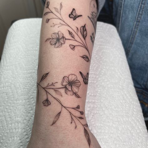 Vine Wrap Around Tattoo, Wraparound Tattoo, Leg Tattoos Small, Arm Wrap Tattoo, Flower Vine Tattoos, Around Arm Tattoo, Butterfly Wrist Tattoo, Wrap Around Tattoo, Tattoos Back