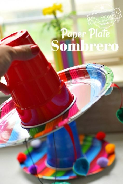 Perfect for Cinco De Mayo. Make this cute and easy paper plate Sombrero for a fun and festive kid friendly craft for Cinco De Mayo or any fiesta! www.kidfriendlythingstodo.com #sombrero #diy #paperplate #craft #cincodemayo #fiesta Sombrero Craft, Mexican Sombrero Hat, Mexican Sombrero, Day And Nite, Sombrero Hat, Kid Friendly Crafts, Craft Easy, Festive Crafts, Fun Crafts To Do