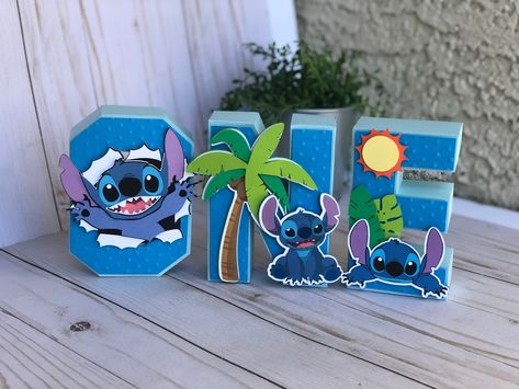 "these ONE Stitch 3D letters is a perfect Stitch party decoration , stitch Birthday décor, Stitch décor, bedroom décor, birthday party. I T E M ~D E T A I L S  ★Materials: high quality cardstock and cardstock glitter. ★Size: 6' and 8\" ★SHIPPING INFORMATION: Turnaround time is  1-2 weeks. If needed sooner I always work on time, if you are in a rush and need your order soon, please contact me, with much pleasure we would love to help you. 3D letters Handmade with love and it is made in 3D with qu Stitch First Birthday, Stitch Party, Stitch Birthday, Boys First Birthday Party Ideas, Baby Boy First Birthday, First Birthday Party Themes, Bedroom Décor, 3d Letters, Lilo Stitch