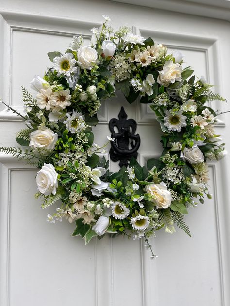 Our Luxury large neutral white and green Spring Year Round wreath is expertly designed with extra large dimensions to make a sophisticated statement in your home. Crafted with premium artificial foliage and florals, it offers a realistic look and feel while the neutral color palette ensures it fits any decor. Make a lasting impression with this premium decor piece. Photographed is the extra large 60cm featuring roses, hydrangeas, daisies, ivy, and so much more. Also available in a 45cm size. Ple Green And White Wreath, Brick Fireplace Decor, Wreath Inspiration, Artificial Foliage, White Wreath, Round Wreath, Artificial Wreath, Green Spring, Year Round Wreath