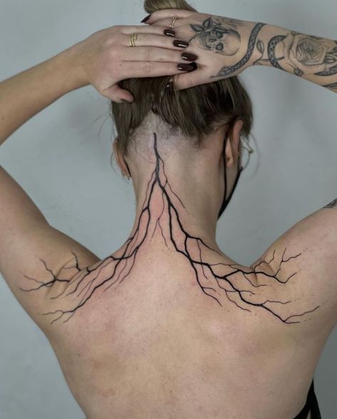 Lightning Bolt Tattoo Back, Lightning Wings Tattoo, Asian Lightning Tattoo, Heart And Lightning Bolt Tattoo, Neck Tattoo Lightning, Lightning Bolt Spine Tattoo, Lightning Collarbone Tattoo, Abstract Spine Tattoos For Women, Purple Lightning Tattoo