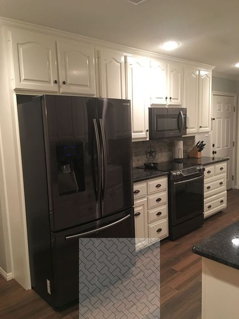 Here is white cabinets, mottled black countertops and a gray backsplash.  The reason I put this here is because the website said the countertops were laminate (but they look pretty good!) Kitchen Cabinets With Black Appliances, Black Stainless Steel Appliances, Black Stainless Appliances, Black Appliances Kitchen, Cheap Countertops, Black Countertops, Black Appliances, Brown Cabinets, Black Kitchen Cabinets