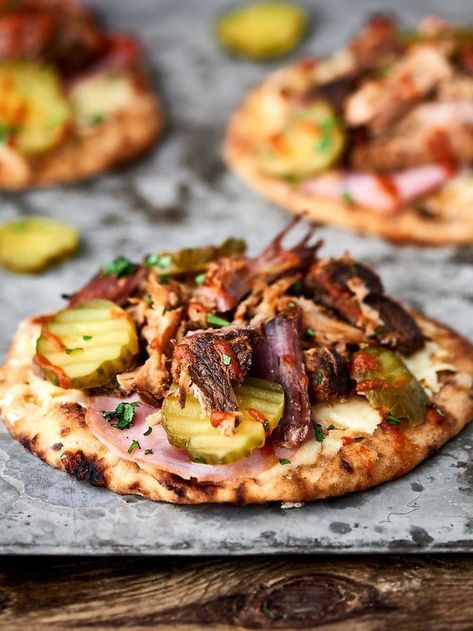 Mini Cuban Naan Pizzas - slow cooker pork, naan bread, swiss cheese, mustard, and pickles! 15 minute dinner. showmetheyummy.com Easy Lunch For Weekends, Naan Bread Sandwiches, Colored Pizza Dough, Cuban Flatbread, Naan Bread Appetizers, Friend Dinner Ideas, Mini Naan Bread Ideas, Naan Bread Ideas, Cuban Pizza