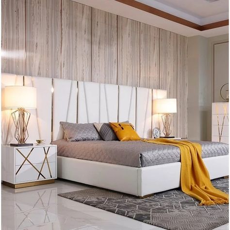 Elite Leather Platform Bed Elevate your bedroom with our chic platform bed. Experience comfort and style with our quality craftsmanship. Tag a friend who would love this! Find more luxury pieces | https://www.luxurior.store/product/platform-bed #bocadolobo #interiordesign #diningtable #diningtabledesign #diningroom #luxuryfurniture #craftsmanship White And Gold Dresser, Bedroom Sets Furniture Queen, Tattoo Modern, Luxury Bedroom Sets, Rooms Decoration, Leather Upholstered Bed, Leather Platform Bed, Gold Bed, Gold Bedroom