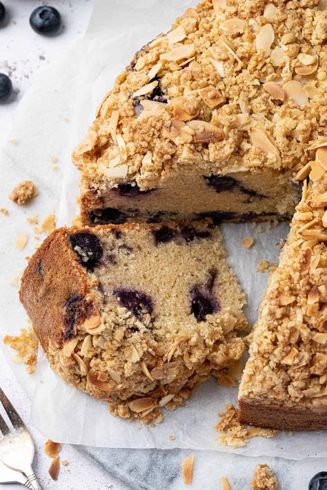 Blueberry crumb cake - soft, moist, fluffy vegan blueberry cake with a hint of lemon and a crunchy almond crumble topping.  This cake is not too sweet and is perfect served with a cup of tea or coffee. Blueberry Cake Vegan, Vegan Blueberry Cake, Almond Crumble, Blueberry Crumb Cake, Crumb Bars, Crumble Cake, Blueberry Crumble, Vegan Cakes, Vegan Blueberry