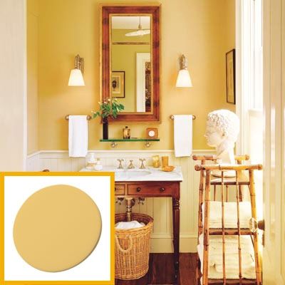 Color tip: warm ochre complements dark wood tones as seen in this classic bathroom. Color: Kitchen & Bath Enamel in Dorset Gold (HC-8), $47 per gallon; Benjamin Moore & Co. Gold Wainscoting, Colonial Bathroom, Gold Painted Walls, British Colonial Decor, British Colonial Style, Bead Board, American House, Colonial Decor, Yellow Bathrooms