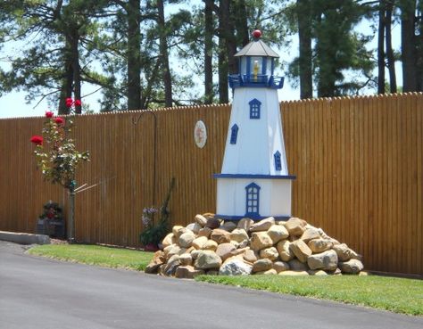 Ornamental lighthouse along driveway in Leipsic, Delaware. The house faces the Leipsic River and this ornament suits its location. Lighthouse Garden Decor, Garden Lighthouse, Beach Trailer, House Lighting Outdoor, Yard Ornaments, House Yard, Beach Ideas, Relaxing Places, Lawn Ornaments