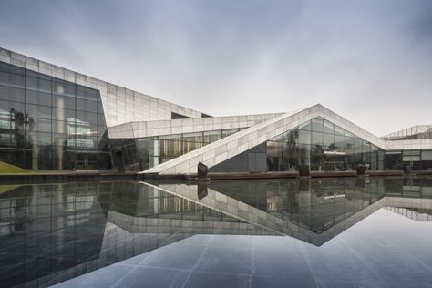 Built by SPARK in Chongqing, China with date 2011. Images by Fernando Guerra. SPARK’s playful Clubhouse in Chongqing has opened to the public. The Clubhouse is the first part of a series of leisu... Water Architecture, Arch Building, Chongqing China, Shigeru Ban, Steven Holl, Reflecting Pool, Oscar Niemeyer, Water Reflections, Chongqing