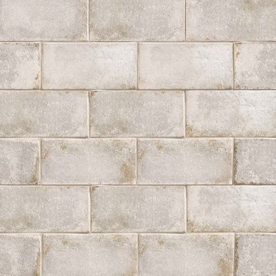 Add a vintage-inspired feel to your space. This versatile, low-maintenance, and features neutral-colored field tiles and patterned decorative tiles, detailed with faux tarnishing. Color: Fossil | Bedrosians Vivace 4" x 9" Porcelain Wall & Floor Tile Porcelain in Gray, Size 9.0 H x 4.0 W x 0.31 D in | Wayfair Matte Tile, Ceramic Subway Tile, Backsplash Tile, Decorative Tiles, Porcelain Flooring, Wall And Floor Tiles, Fireplace Surrounds, Shower Floor, Subway Tile