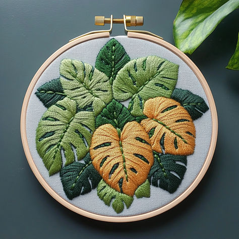 Add a touch of nature to your home with this Monstera Leaf Hand Embroidery Pattern! 🍃 This beautiful design features lush green and golden leaves, perfect for plant lovers and embroidery enthusiasts of all levels. 🌿 Create stunning hoop art that brings the beauty of the jungle indoors. Instantly downloadable, this pattern makes embroidery stitching fun and easy. Let’s stitch and bring these vibrant leaves to life! #HandEmbroidery #EmbroideryPattern #MonsteraLeaf #PlantLovers #DIYCrafts Monstera Embroidery, Leaves Wall Decor, Botanical Embroidery, Embroidery Diy, Embroidery Template, Wall Decor Modern, Monstera Leaves, Cadeau Diy, Hand Embroidery Pattern