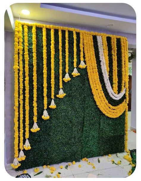 Simple Wedding Stage, Haldi Decoration Ideas At Home, Marigold Garland, Faux Garland, Haldi Decoration Ideas, Ganpati Decoration Theme, Haldi Ceremony Decorations, Small Wedding Decor, Ganesh Chaturthi Decoration