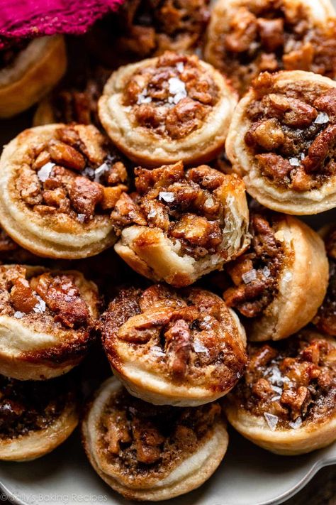 These mini pecan pies are adapted from my grandmother's pecan pie recipe. Made with my favorite homemade pie crust and a salted pecan filling, they're always a welcome salty-sweet addition to any Thanksgiving holiday dessert spread. Recipe on sallysbakingaddiction.com Pecan Pie Tarts, Pecan Filling, Pecan Pie Crust, Pecan Pie Easy, Homemade Pie Crust, Mini Pecan Pies, Pecan Pies, Sally's Baking, Dessert Spread