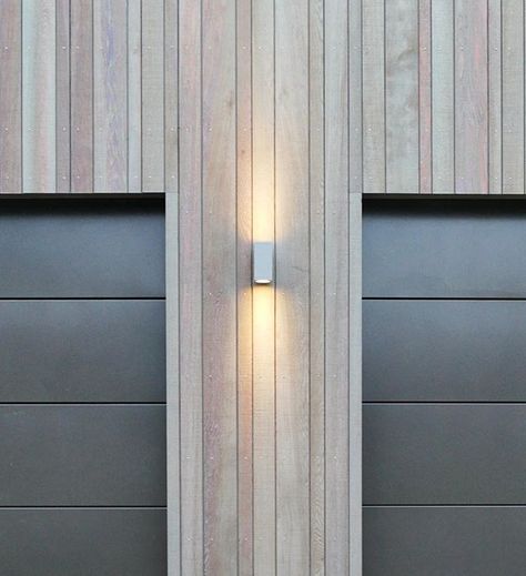 The silver exterior wall lights have been fitted to the exterior walls of the Cedar House. These are up and down lights which are designed to emphasize the the vertical cedar shiplap weatherboard walls.  Photo by @designloungenz   #DesignLoungeNZ. . .  . Don't forget to follow me @designloungenz . . Visit our Online Shop at https://ift.tt/2A77HyD or our regular design website at www.designlounge.co.nz for commissions. . Images remain copyright of @designloungenz. If your would like to purchase t Cedar Shiplap Exterior, External Wood Cladding House Exteriors, Vertical Cladding House Exterior, Wood Effect Cladding Exterior, Vertical Wooden Cladding Exterior, Vertical Larch Cladding, Charred Timber Cladding Extension, House Exterior Cladding, Cedar Shiplap