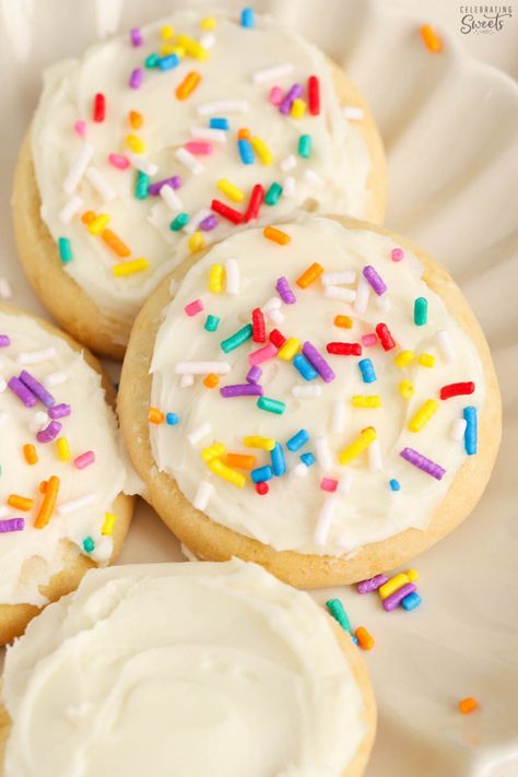 Frosted sugar cookies topped with rainbow sprinkles on a white plate. Simple Sugar Cookie Recipe, Christmas Cookie Frosting, Celebrating Sweets, Cookie Glaze, Cookie Icing Recipe, Christmas Yummies, Frosting Recipes Easy, Simple Sugar, Sugar Cookie Icing