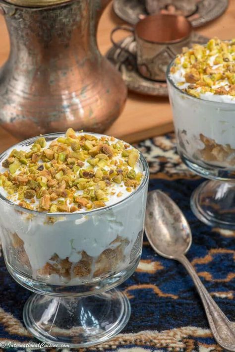 A sweet creamy dessert topped with pistachio nuts called esh asaraya, you will love this recipe from Qatar. Saudi Dessert, Qatar Recipes, Qatar Food, Karak Tea, 21 November, Global Food, Ethnic Food, Popular Desserts, Dessert Toppings