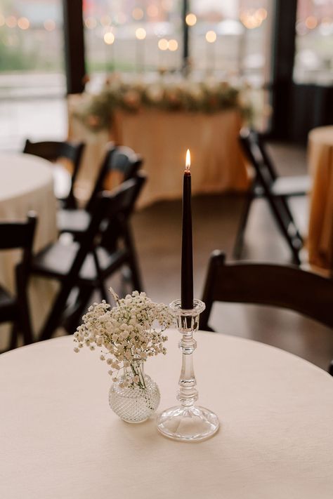 Moody Black Taper Candle in Vintage Votive with Baby's Breath in Bud Vase for Wedding Reception Centerpiece Black Candle Centerpieces, Black Candle Wedding, Taper Candle Centerpiece, Cocktail Table Centerpieces, Black Wedding Table, Wedding Reception Candles, Wedding Votives, Bud Vases Wedding, Wedding Reception Centerpiece