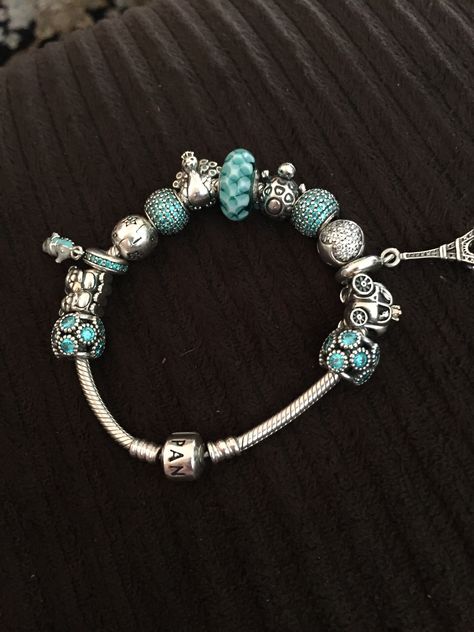 My teal color themed pandora bracelet Teal Pandora Bracelet, Themed Pandora Bracelet, Teal Jewelry, Pandora Bangle, Teal And Pink, Teal Color, Pandora Bracelet, Teal Colors, Pandora Jewelry