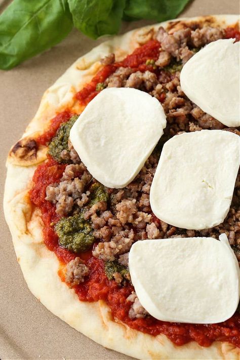 Add fresh mozzarella and crumbled Italian sausage to make an authentic pizza at home! Homemade Pizza Sausage, Italian Sausage Pizza Recipes, Pizza Sausage Recipe, Pizza With Fresh Mozzarella, Fresh Mozzarella Pizza, Take Out At Home, Pizza With Sausage, Sausage Pizza Recipe, Italian Sausage Pizza