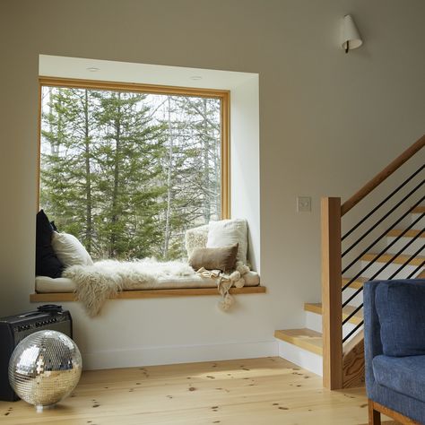 The Calliope picture window has our hearts. Whether it's the place to enjoy your morning coffee or listen to raindrops, this window is the perfect cozy corner. #MODE #Calliope #readytobuild #houseplans #passivehouse #ecofriendlyhome #cabininthewoods Cozy Windowsill, Cubic Window Corner, Big Corner Window, Cozy Window Seat Aesthetic, Build Your House, Corner Window, Cabin In The Woods, Passive House, Picture Windows