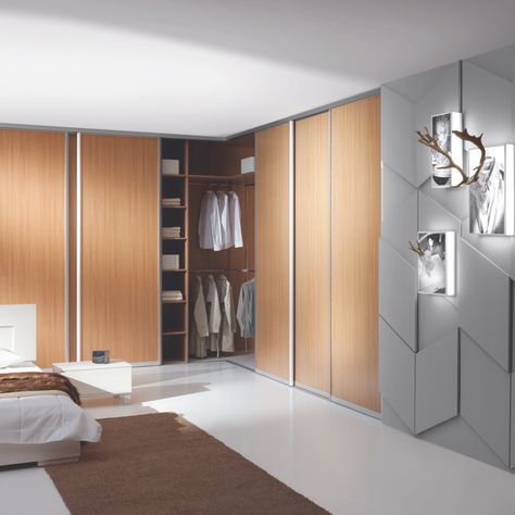 Our Aluminum Lazuryt Magnetic Sliding Doors come together in a corner to create a closet or close up a space with an “L-Shaped” configuration. When in an opened position you can access almost the entire space as the doors can slide behind existing walls. Available with several laminate wood and glass options. Special magnetic strip holds the corner doors together. Corner Wardrobe Closet, Office Partitions Wall, Folding Wardrobe, Multifunctional Room, Corner Closet, Fitted Bedroom Furniture, Bedroom Wardrobe Design, Corner Wardrobe, Fitted Bedrooms