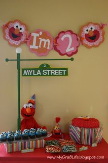 Elmo Party Ideas...Banner, elmo mural, use toys in decoration, Grant Street with the number 2 for welcome sign. Elmo Party Ideas, Sesame Street Signs, Cookie Monster Cupcakes, Elmo Cake, Elmo Birthday Party, Monster Cupcakes, Second Birthday Ideas, Sesame Street Birthday Party, Elmo Party