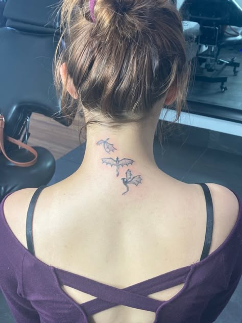 3 dragon tattoos on the back of neck Dragon Tattoo Neck Woman, Dragon Tattoo Back Of Neck, Dragon Neck Tattoo For Women, Neck Dragon Tattoo, Dragon Tattoo On Neck, Mini Dragon Tattoo, Dragon Neck Tattoo, Dragon Tattoo Neck, Baby Dragon Tattoos