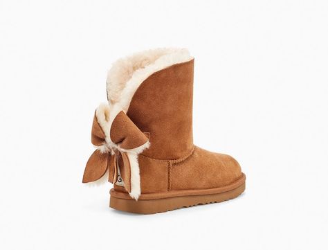 Classic Mini II Cuffed Bow Boot for Toddlers | UGG® Ugg Classic Mini Ii, Ugg Store, Bow Boots, Ugg Classic Mini, Ugg Classic, Classic Boots, Woven Labels, Classic Mini, Slipper Shoes