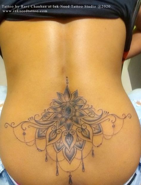 Lower Back Tattoos Mandala, Ladies Lower Back Tattoos, Tailbone Tattoos For Women, Ornamental Lower Back Tattoo Women, Lotus Flower Tattoo Lower Back, Lower Back Mandala Tattoo, Bottom Of Back Tattoo Women, Large Lower Back Tattoos For Women, Tattoo Ideas Female Lower Back